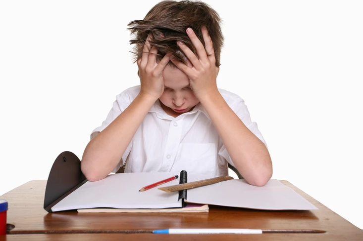 kid frustrated with his homework